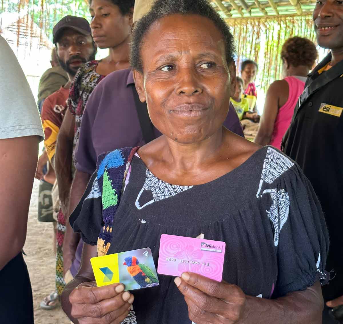 Woman holding a Digizen card